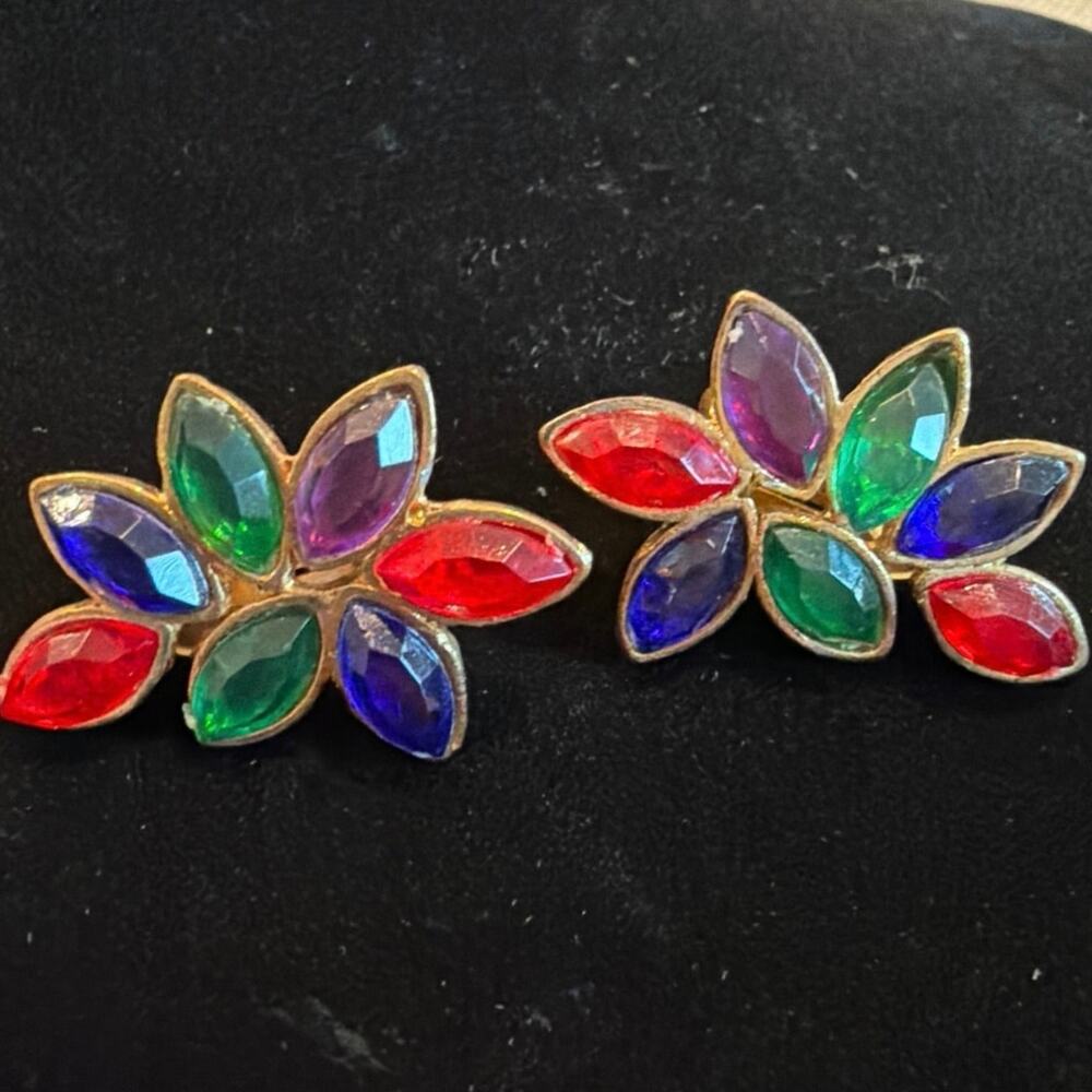 Vintage multicolor rhinestone clip on earrings set in a gold tone metal
